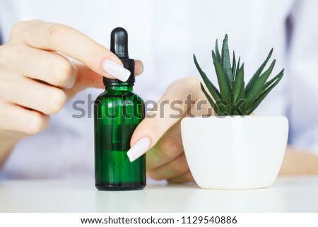 Herb Medicine. The Scientist, Dermatologist Make The Organic Natural Herb Cosmetic Product in The Laboratory. Beauty Healthy Skincare Concept. Cream,Serum.
