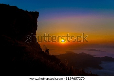 Sunrise scene with the peak of mountain and cloudscape at Phu chi fa Forest Park Province in Chiang Rai,Thailand