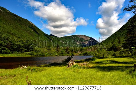 Mountain pond with scenic views