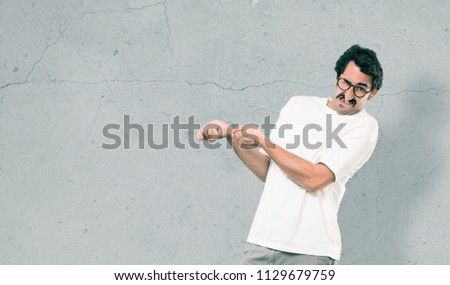 young crazy man pulling sign..full body cutout person against white background