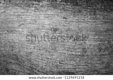 Art Black concrete texture for background in black. color dry scratched surface wall cover sand art abstract colorful relief scratches shabby vintage concrete grey detail stone covering.
