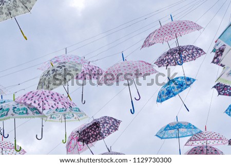 Colorful umbrellas hanging beautiful background wallpaper.