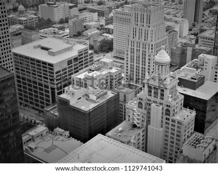An aerial view looking down into the core of downtown Houston.