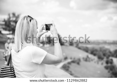 Woman with telephone take a selfie on vacation and enjoy the moment 