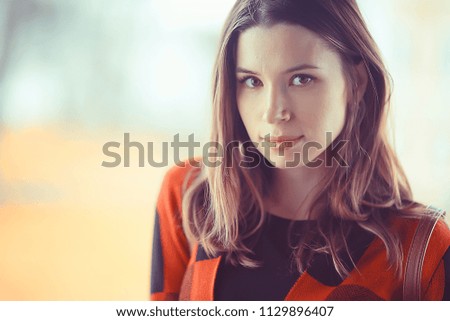 girl in coat outdoor / autumn photo model girl adult posing in park, girl in coat with long hair