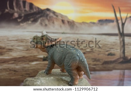 Cute baby triceratops on jurassic era