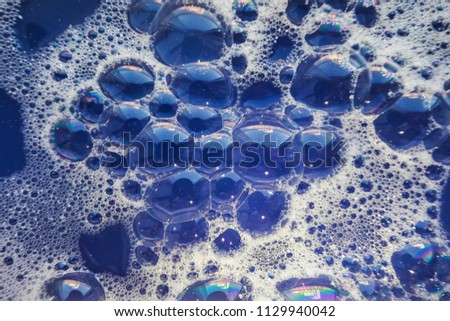 Blue soap bubbles. Abstract bubbles from soap for background.      