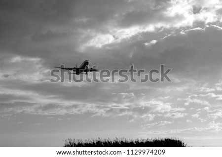 
Airplane taking off at the Barcelona airport on March 30, 2018. Black and white photography.