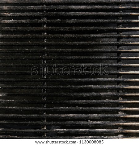 Old Empty Barbecue Grill Texture with a Thick Layer of Soot and Carbon. Dirty Iron Bbq Lattice Background Top View with Place for Text. Dark Key Photo Template for Product Advertising