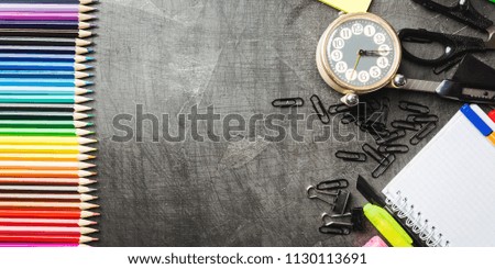School supplies on blackboard background, back to school concept ready for design