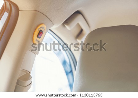 Emergency stop button in green light taxi for safe passenger in bangkok Thailand