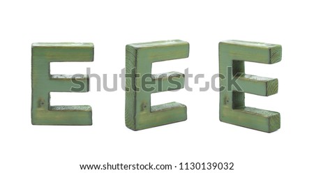 Single sawn wooden E letter symbol in different angles and foreshortenings isolated over the white background