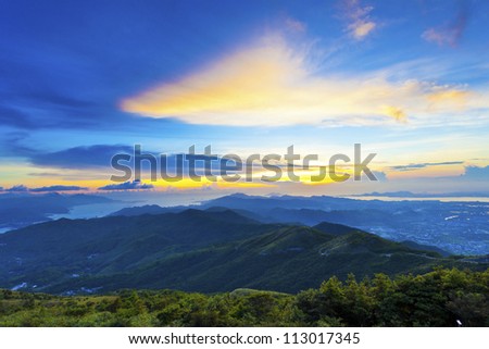 Majestic mountain sunset and sky with colorful clouds
