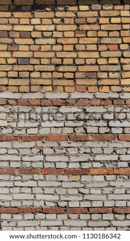 brick wall, laid out inaccurately, wide angle, panorama, the background of the wall is lined with layers and strips of brick of different color and size