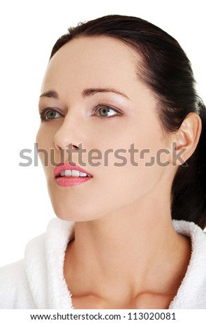 Portrait of young beautiful woman in bathrobe ready for spa
