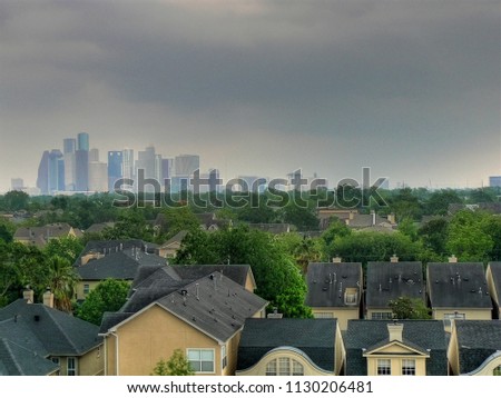 Downtown Houston's skyline over the Montrose area.