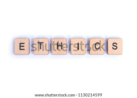 The word ETHICS, spelt with wooden letter tiles.