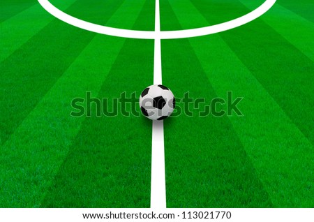 soccer ball on the green grass field