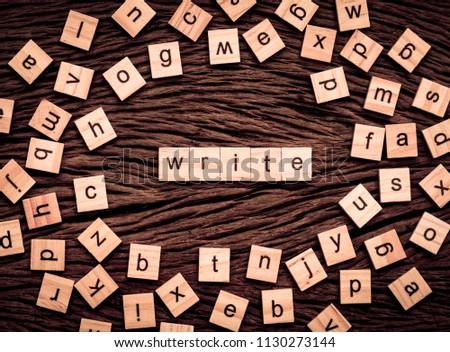 Write word written cube on wooden background. Vintage concept.
