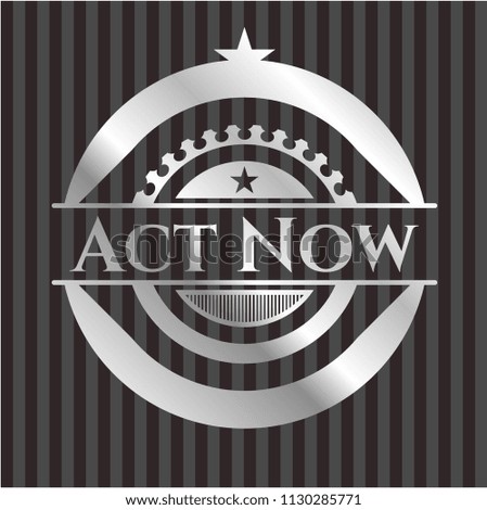 Act Now silvery emblem or badge