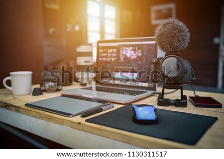 Studio office house the laptop Camera and drone gear for editor man or freelance Vlogger  Royalty-Free Stock Photo #1130311517