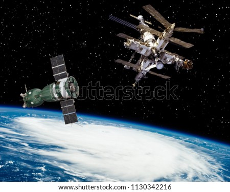 Earth space station and space craft or satellite. The elements of this image furnished by NASA.
