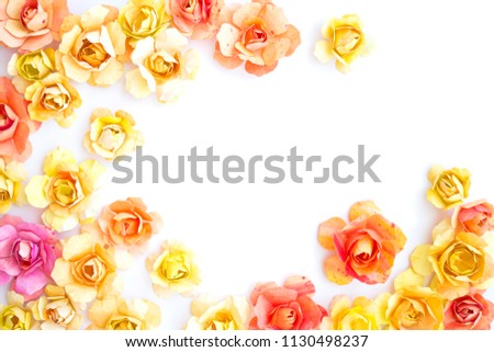 frame of colorful paper yellow, orange flowers, roses on white background