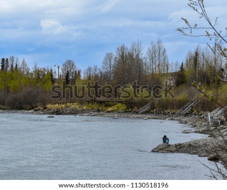 Scenery with water in it.  Taken in Alaska and Canada.  Rivers, flowers, grass, mountains, woods and more can be seen in these photos.