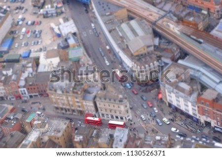 An aerial view of the streets of south London with a miniature effect.