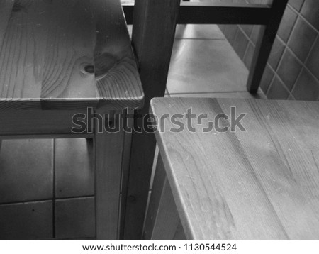 Kitchen tiles and furniture in black and white