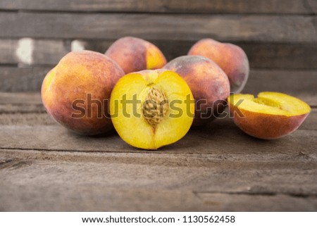 Peaches on a wooden background, fruit