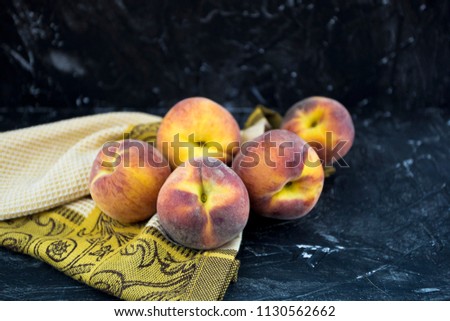 Peaches on a black background, fruit