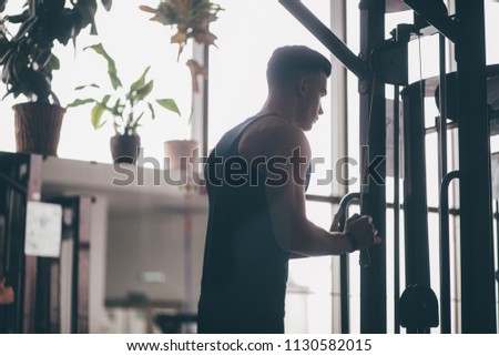 man trains in the gym