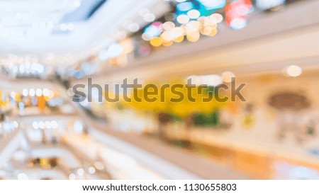 Blurred image of interior in shopping mall for background.