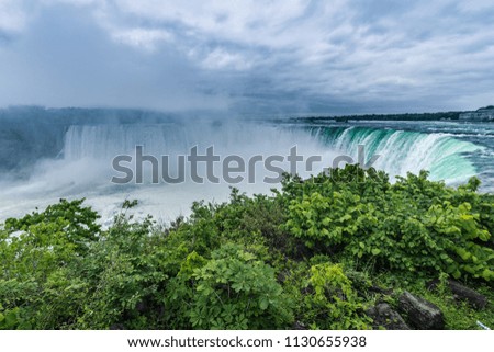 Canadian Niagara Falls panorama with a rainbow