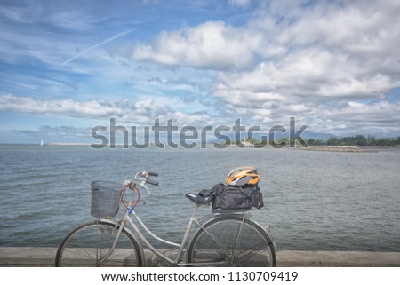 Gray  bicycle on  beach road over blue sea and clear color sky background