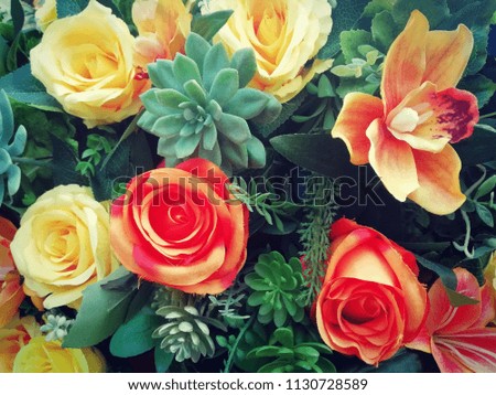 Close up picture of yellow and orange roses for decoration.