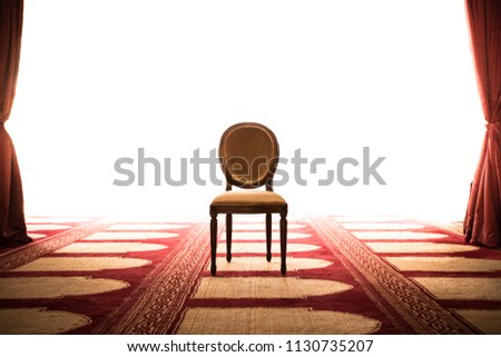 A chair in the middle. Fit for a King. Strong beautiful backlight.