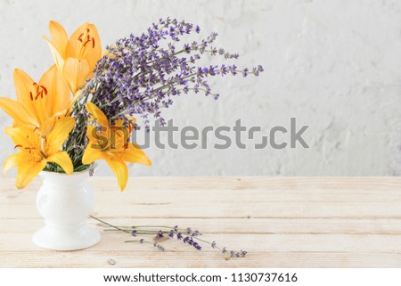 flowers in vase on white background