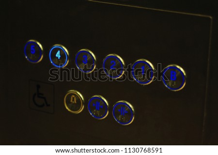 Interior and closeup of metal buttons in elevator.selective focus.