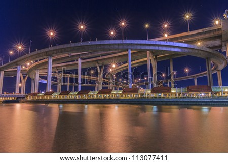 Mega bridge reflect the river front