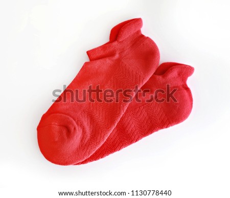 Red color socks isolated on white background