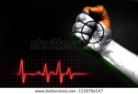 Flag of India painted on male fist, the concept image shows the strength of medicine or politics in countries, photography has a good place for your text