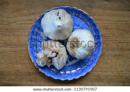 Fresh garlic on plate
