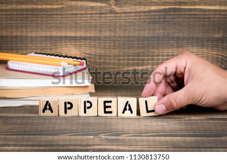 Appeal. Wooden letters on the office desk, informative and communication background Royalty-Free Stock Photo #1130813750