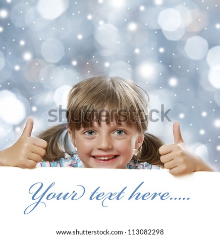 little girl and white board with empty space - christmas background