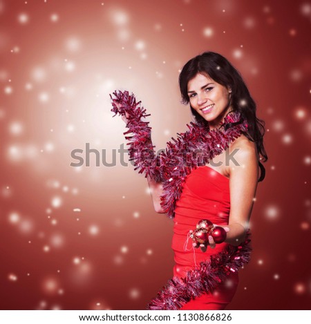 beautiful girl dressed as Santa Claus on Christmas background