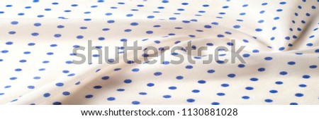 Texture. Drawing. Silk fabric. Polka blue on white background, It is an excellent retro fabric for protecting surfaces, creating fun settings and crafts.