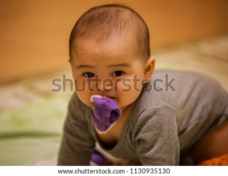 Portrait of joyful baby boy