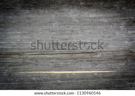 Old weathered wooden board, background. Wood texture.